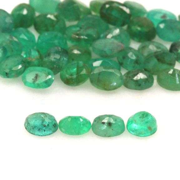 Rich emerald green 8.09ct 40pc Emerald set