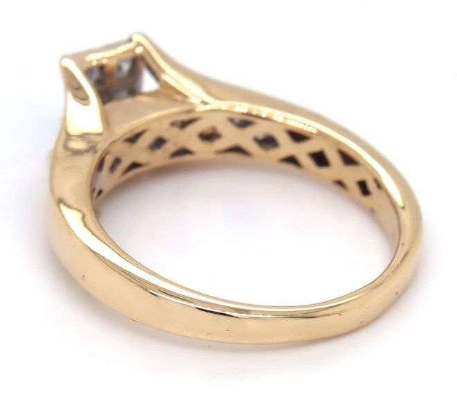 14kt Yellow gold 1ctw Invisible set diamond ring