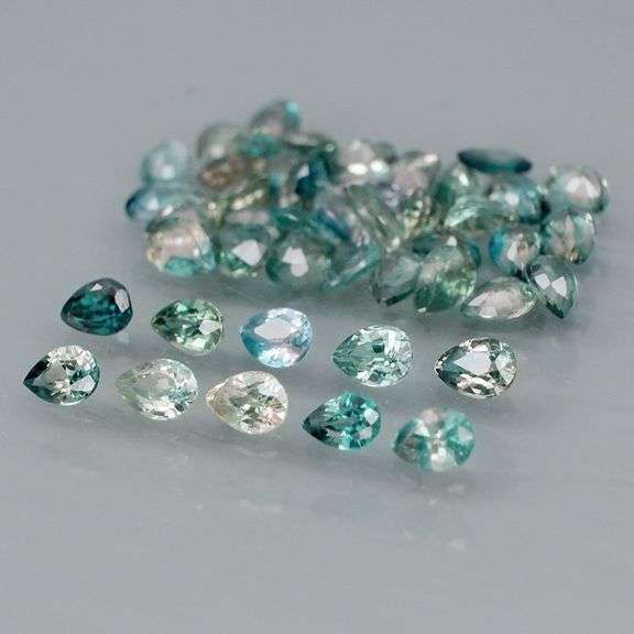Heated only! 6.10ct blue green Sapphire set!