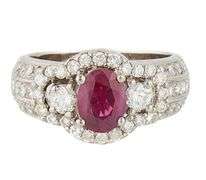 1.50ct Oval Ruby and 1.30ctw Diamond Three Stone Halo Statement Ring in 18K