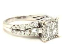 14kt White gold 1.25ctw Invisible set princess cut and round brilliant cut baguette ring