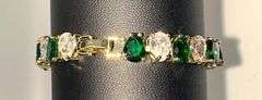 18 Kt White Gold Plated Huge 32.5 Ctw Lab Simulated Diamond and Green Emerald Tennis Bracelet