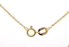 14kt Yellow gold 1.20ct oval ruby and diamond halo pendant on chain