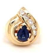 14kt Yellow gold 1.10ct sapphire and 0.50ctw diamond swirl ring