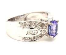 14kt White gold oval tanzanite and diamond ring