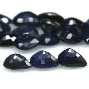 Beautifully colored 6.58ct ink blue Sapphire set
