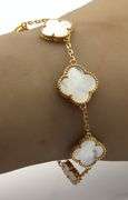 Set of 21kt Yellow gold mother of pearl bracelet and earrings