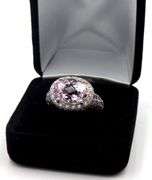 18kt White gold East west Oval Kanzanite and diamond halo cocktail ring