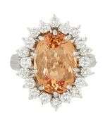 5.25ct Oval Imperial Topaz and 1.00ctw Diamond Starburst Frame Ring in 14K