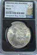 1884 O NGC MS 64 Morgan Dollar.With Original Bag Fragment