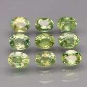 Untreated! Fantastic 2.50ct bright green Sapphire set!