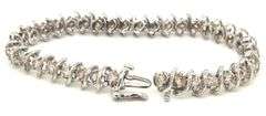 14kt White gold approximate 5.40ctw diamond S link tennis bracelet