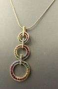 14kt Yellow gold Chameleon multi gemstone and diamond triple circle exchangeable drop pendant on cha