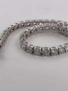 CERTIFIED BRAND NEW 14K WHITE GOLD TENNIS BRACELET. 10.00 CARATS OF DIAMONDS.