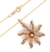 14kt Yellow gold diamond and seed pearls sunburst pendant on chain