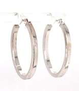 14kt White gold oval hoop earrings
