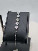 Charming 18kt White Gold Bracelet With Heart Shaped Diamond Accents