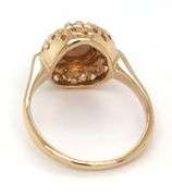 14kt Yellow gold Oval opal and diamond halo ring