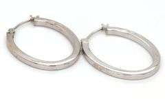 14kt White gold oval hoop earrings