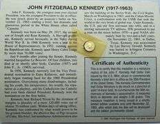 Two Solid 14 K Gold JFK Memorial Half Dollars.