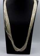 Set of 925 sterling silver multi strand necklace and dangle earrings