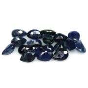 Beautifully colored 6.58ct ink blue Sapphire set