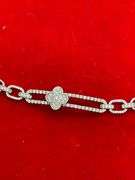 CERTIFIED BRAND NEW 14K GOLD AND DIAMOND SLIDING CLOVER BRACELET