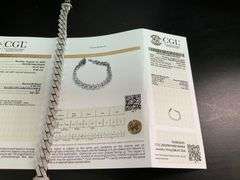 CERTIFIED 14K WHITE GOLD DIAMOND CUBAN LINK BRACELET.