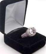 18kt White gold East west Oval Kanzanite and diamond halo cocktail ring