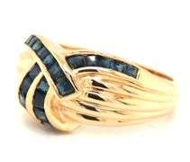 14kt Yellow gold blue sapphire channel set square cut crossover dome ring