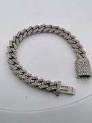 CERTIFIED 14K WHITE GOLD DIAMOND CUBAN LINK BRACELET.