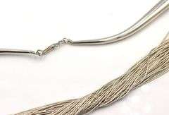 Set of 925 sterling silver multi strand necklace and dangle earrings