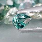 Heated only! 6.10ct blue green Sapphire set!