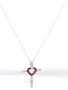 14kt White gold ruby and diamond heart cross pendant on chain