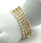 4.5-5m Four row pearl emerald station bracelet in yellow gold