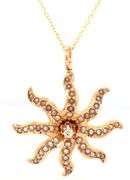 14kt Yellow gold diamond and seed pearls sunburst pendant on chain