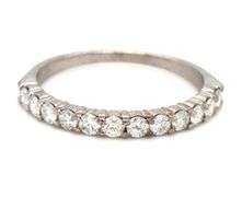14kt White gold shared prong diamond band
