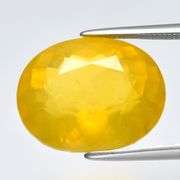 Huge! 7.81ct untreated faceted golden Opal!