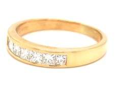 18kt Yellow gold 1.07ctw princess cut channel set diamond band