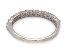 14kt White gold shared prong diamond band