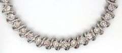 14kt White gold approximate 5.40ctw diamond S link tennis bracelet