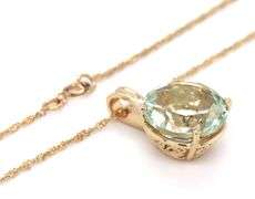14kt Yellow gold round Prasolite pendant on chain