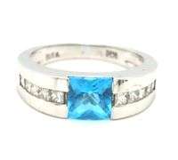 14kt White gold 0.80ct blue topaz and 0.50ctw diamond ring