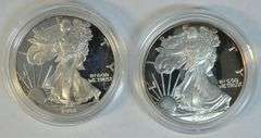 Gem Proof $1 Silver Eagles from 1998 & 2004 in velvet boxes