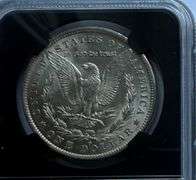 1884 O NGC BU Morgan Dollar.With Original Bag Fragment