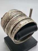 Great! Antique Russian silver, marked 84, quantity of 12 hand hammered antique silver bangles.