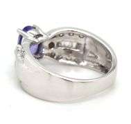 14kt White gold oval tanzanite and diamond ring