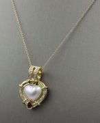 18kt Yellow gold heart shaped Mabe pearl and pear ruby and diamond accent enhancer pendant on chain