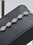 Charming 18kt White Gold Bracelet With Heart Shaped Diamond Accents