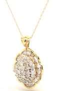 14kt Yellow gold diamond cluster pendant on chain